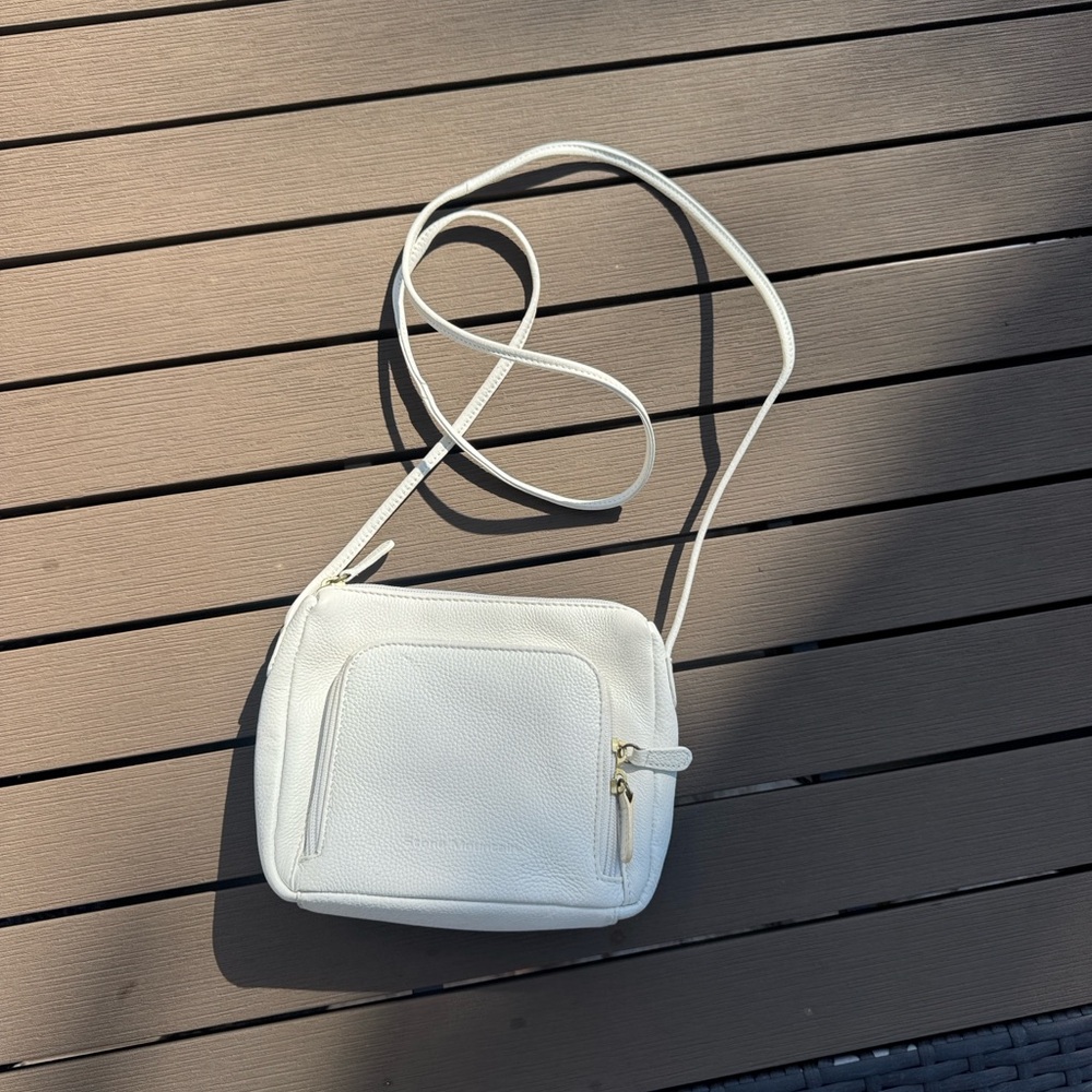 Stone Mountain Crossbody Bag with plenty pockets in like new condition